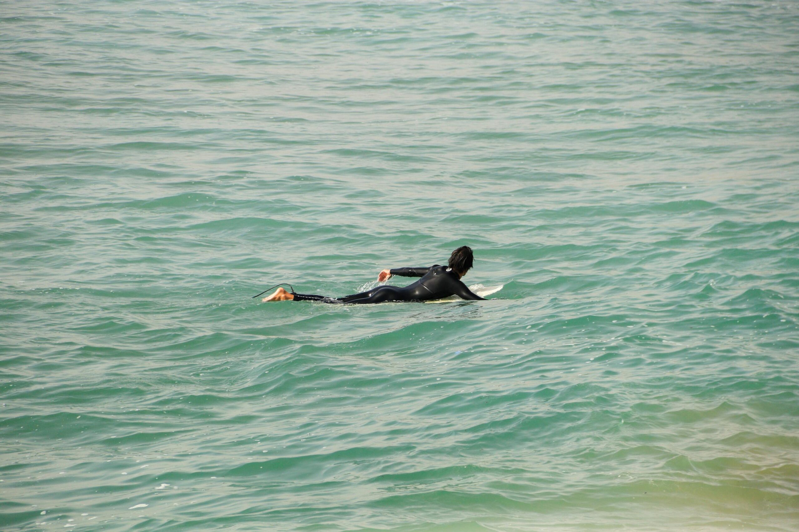 Surfer riding a wave along the Moroccan Atlantic coast